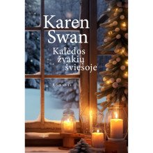 Kalėdos žvakių šviesoje